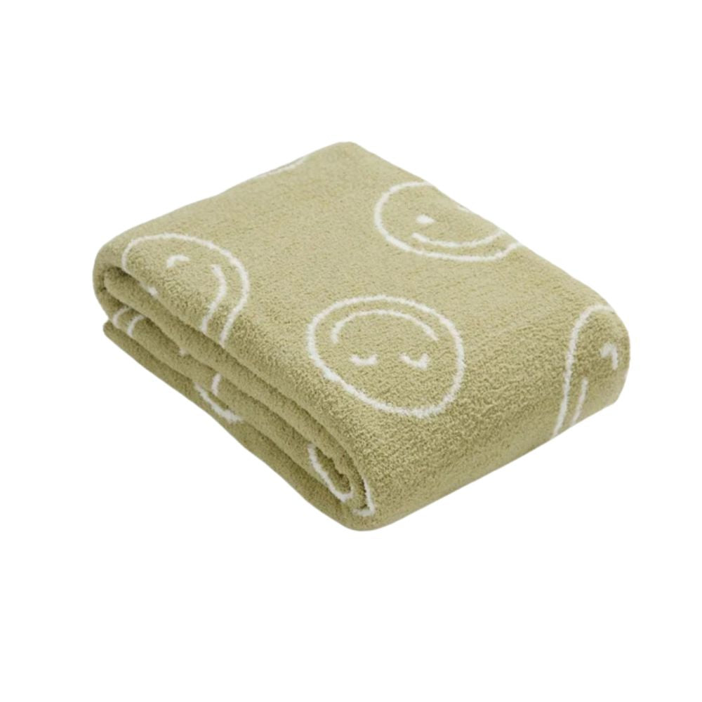 Couverture câline avec visage souriant pour plus de confort et de style 0