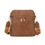 Elevate your style with the chic anti-theft Natalie crossbody bag, featuring trendy fringe accents.