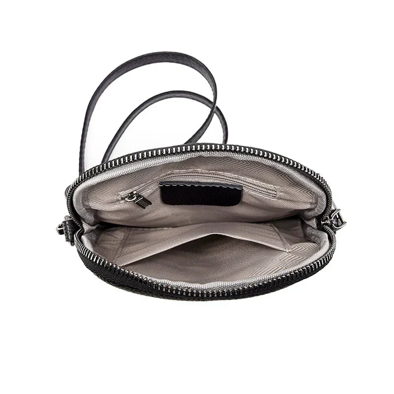 Remington | Tyylikäs olkalaukku naisille kevyestä aidosta nahasta