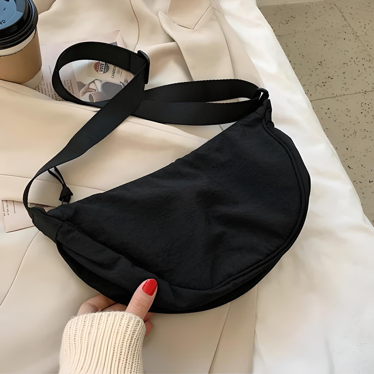 Stylish purple dumpling shoulder bag for fashionable women
