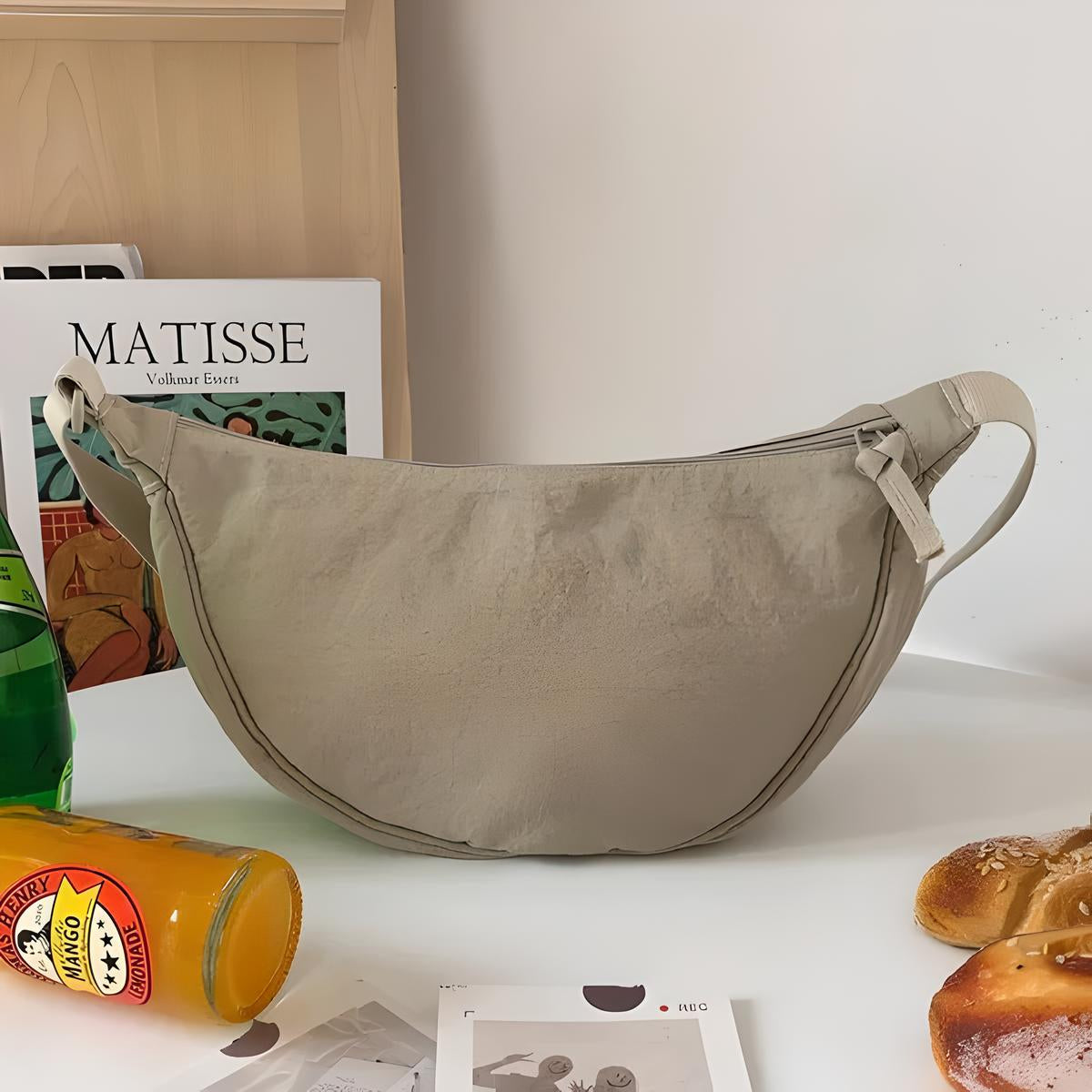 Stylish purple dumpling shoulder bag for fashionable women