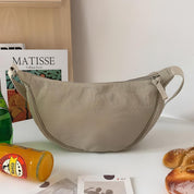 Stylish purple dumpling shoulder bag for fashionable women