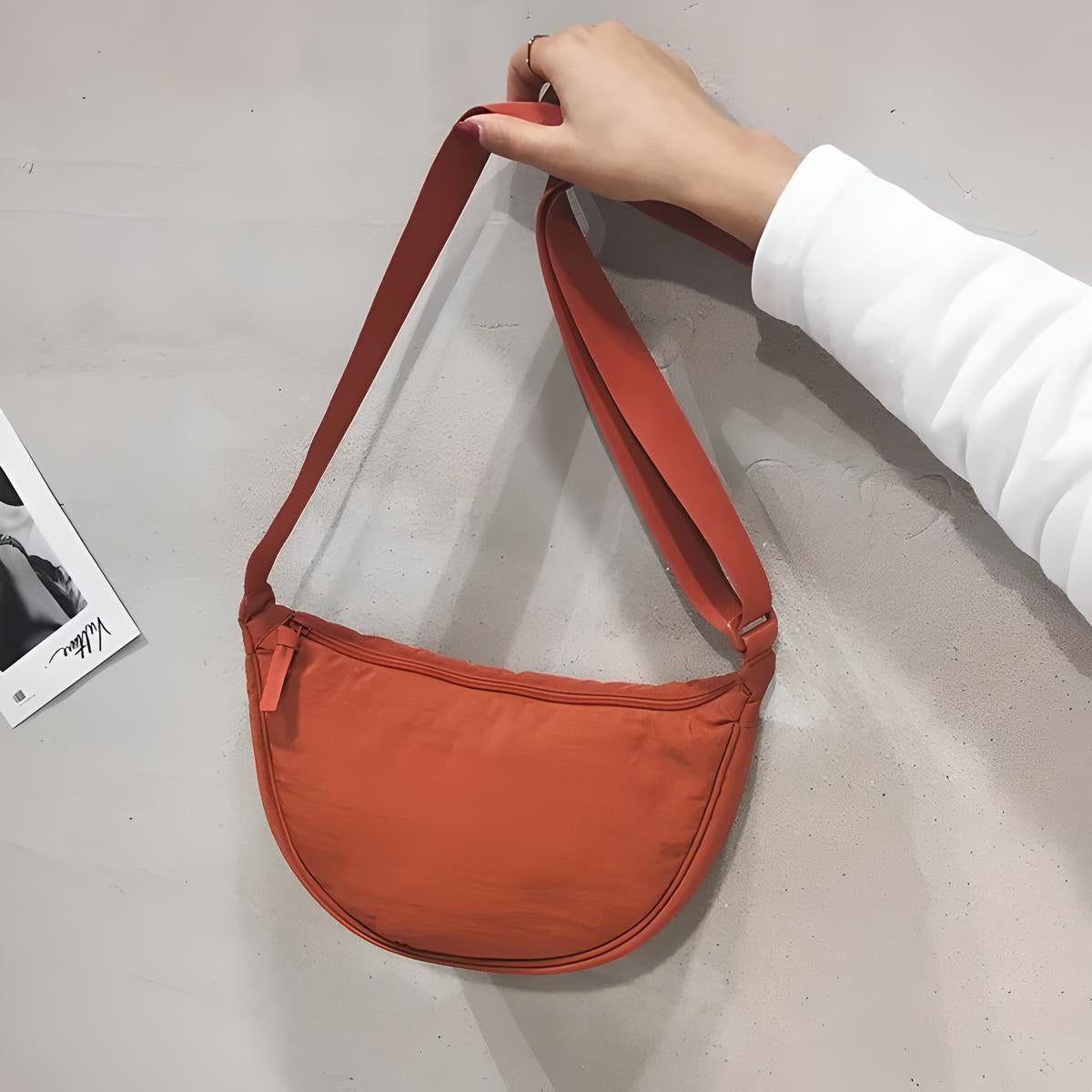 Stylish purple dumpling shoulder bag for fashionable women