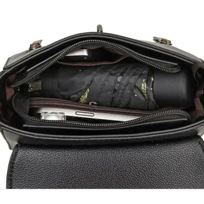 Mallory | Naisten nahkainen retro-soljellinen olkalaukku