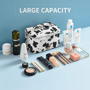 Magdalena | Vesitiivis PU-nahkainen meikkilaukku lehmänkuviolla