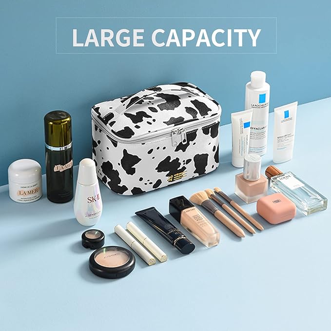 Magdalena | Vesitiivis PU-nahkainen meikkilaukku lehmänkuviolla