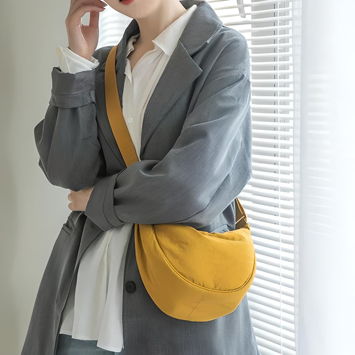 Stylish purple dumpling shoulder bag for fashionable women