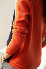 Aquisha | Pull femme avec des rayures rétro en marine et orange