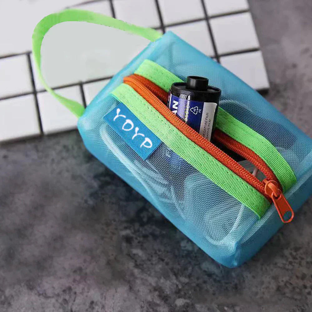 Raina | Trousse de maquillage en maille transparente et colorée