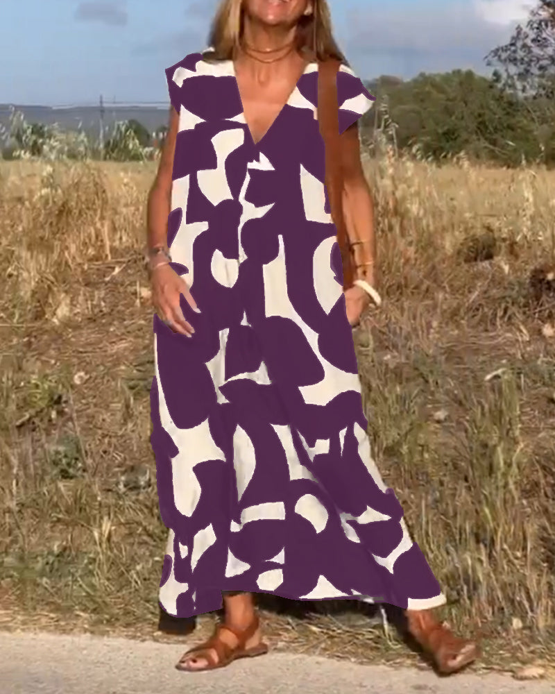 CLAIRE | Maxi-mekko painatuksella ja V-pääntiellä