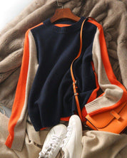 Aquisha | Pull femme avec des rayures rétro en marine et orange