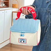 Alianna | Trousse de maquillage matelassée avec porte-bonheur