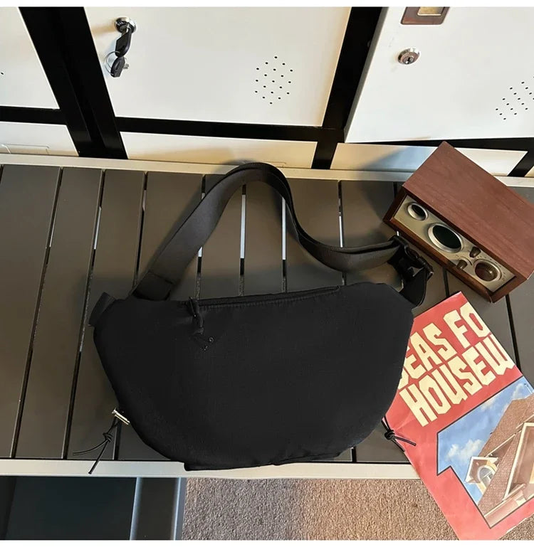 Cassius | Ulkokäyttöön tarkoitettu miesten olkalaukku ristikkäin kantaen