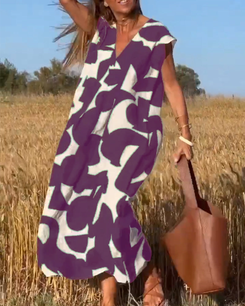 CLAIRE | Maxi-mekko painatuksella ja V-pääntiellä