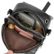Elegant og kompakt skulderveske i elfenben