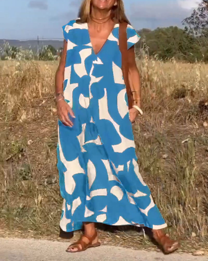 CLAIRE | Maxi-mekko painatuksella ja V-pääntiellä