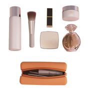 Melanie | Kompakt og praktisk clutch for sminkeessensialer