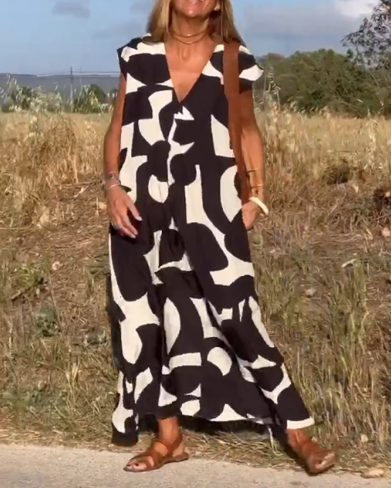 CLAIRE | Maxi-mekko painatuksella ja V-pääntiellä