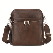 Elevate your style with the chic anti-theft Natalie crossbody bag, featuring trendy fringe accents.