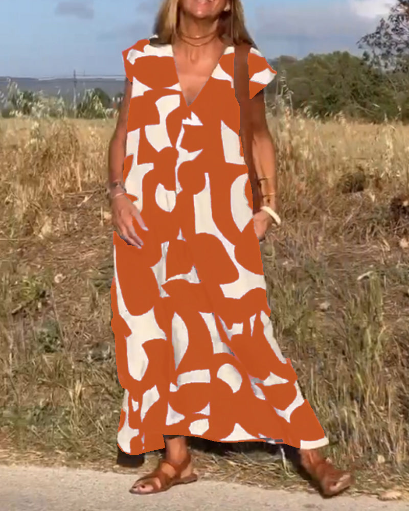 CLAIRE | Maxi-mekko painatuksella ja V-pääntiellä
