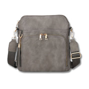 Elevate your style with the chic anti-theft Natalie crossbody bag, featuring trendy fringe accents.