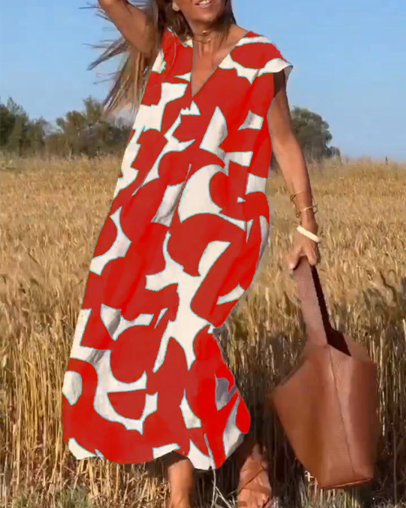 CLAIRE | Maxi-mekko painatuksella ja V-pääntiellä
