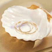 Boucles d'oreilles Sorel dorées – Accessoires élégants et confortables 5