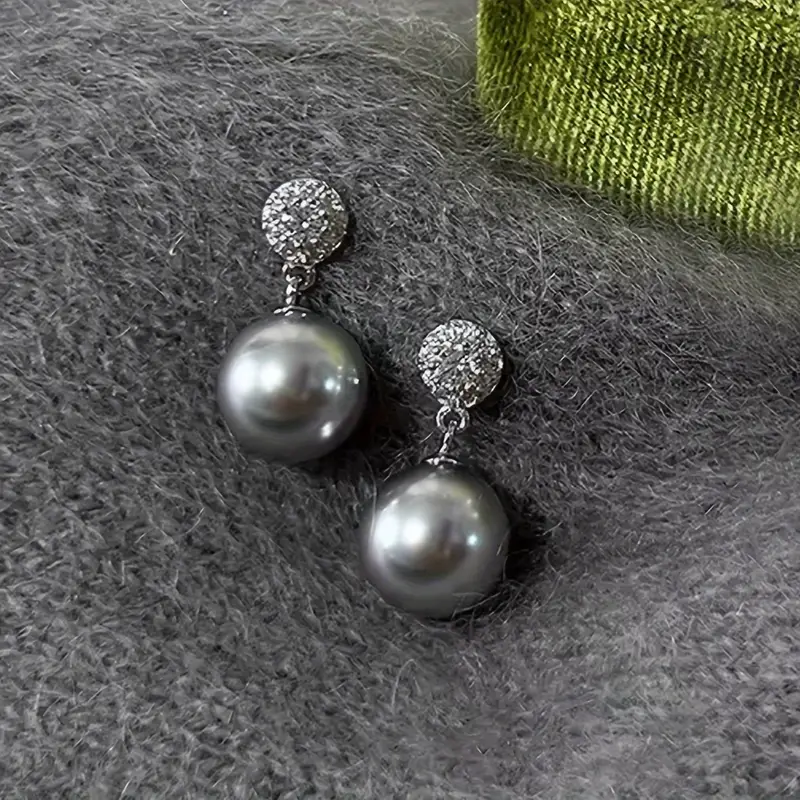 Boucles d'oreilles élégantes en perles noires – Un accessoire luxueux pour toutes les occasions 0