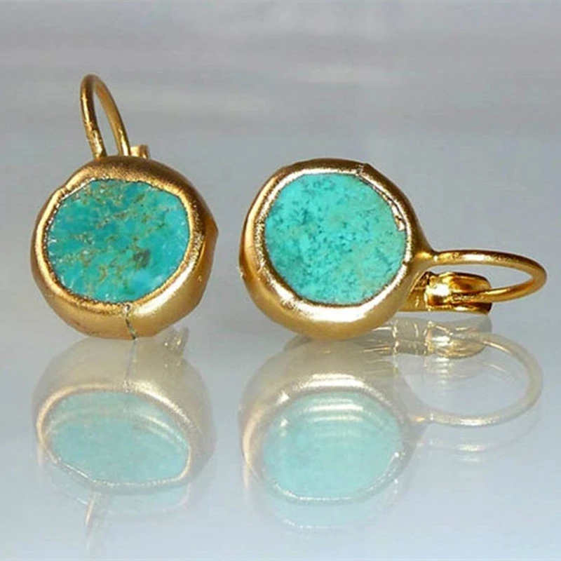 Boucles d'oreilles en or avec pierre turquoise – Un bijou élégant pour toutes les occasions 1