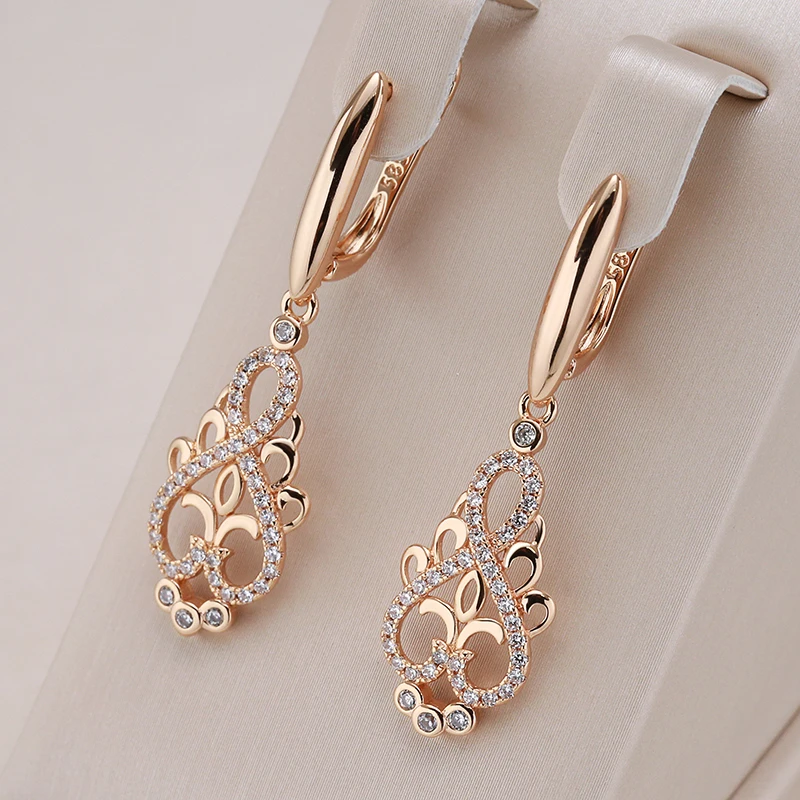 Boucles d'oreilles fée dorées – Bijoux élégants, design léger, parfaits pour toutes les occasions 0