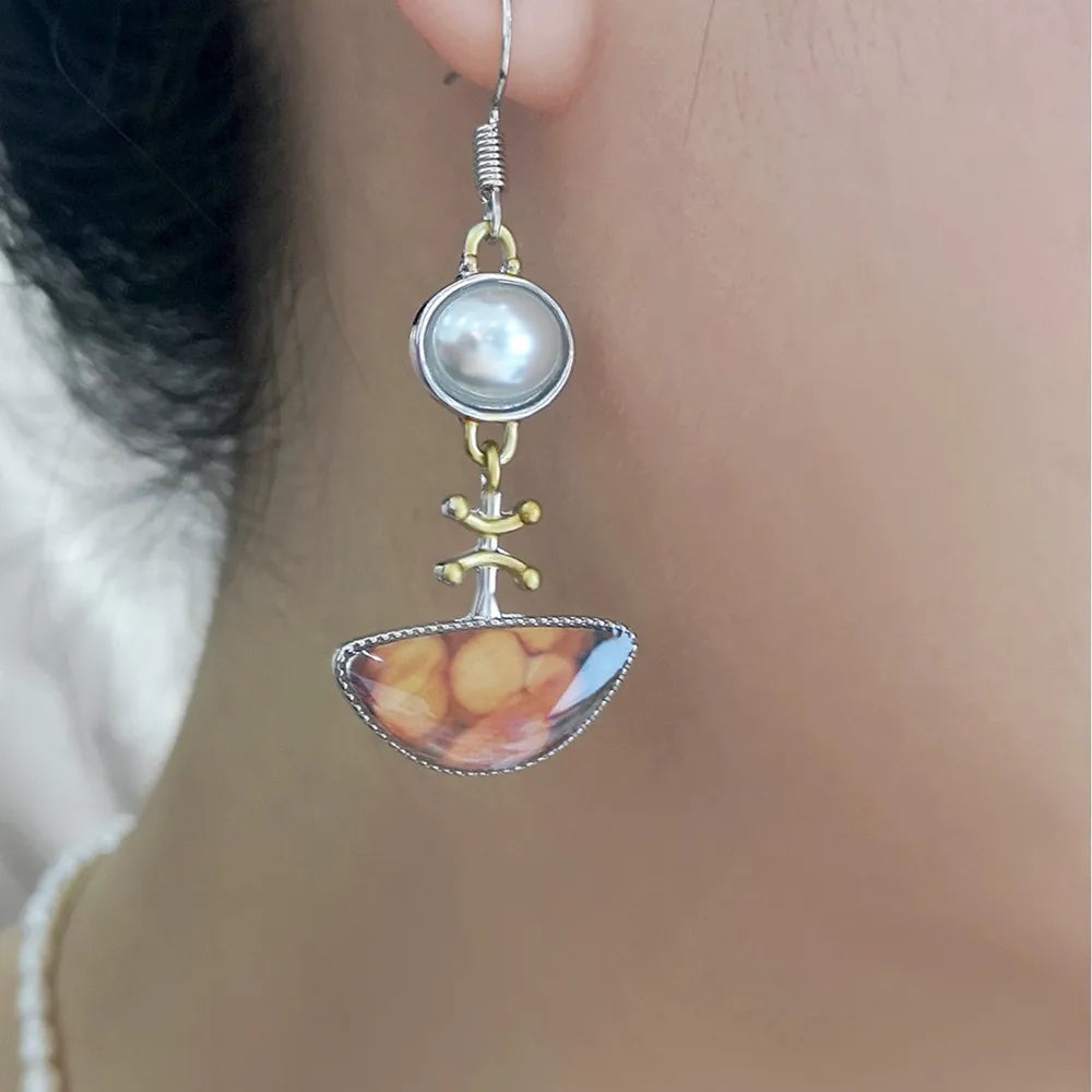 Boucles d'oreilles rétro orange – Des bijoux élégants pour toutes les occasions 1