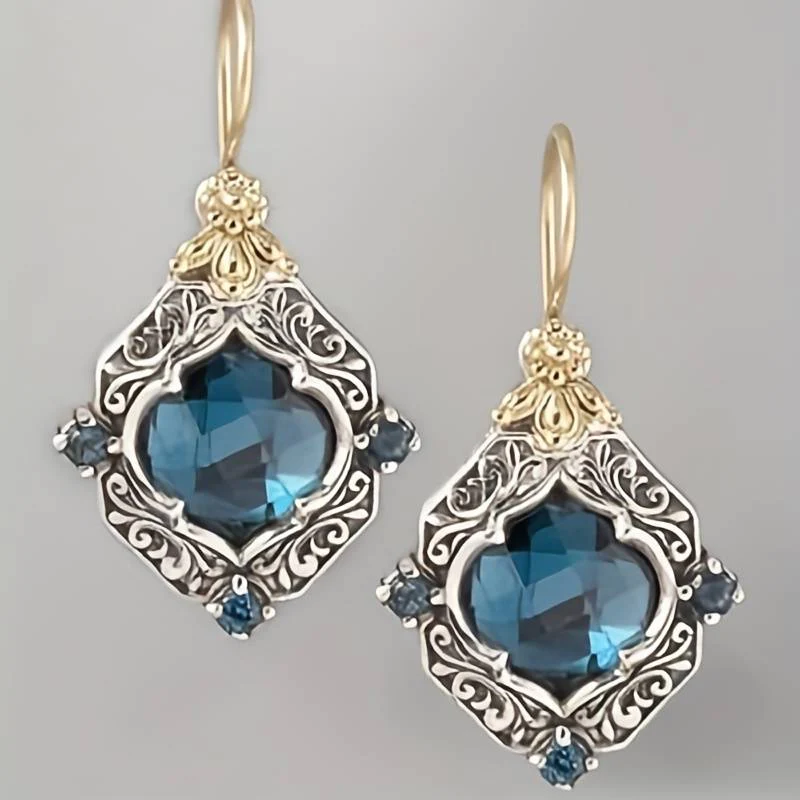 Boucles d'oreilles vintage en argent ornées de cristaux – Bijoux élégants pour toutes les occasions 0