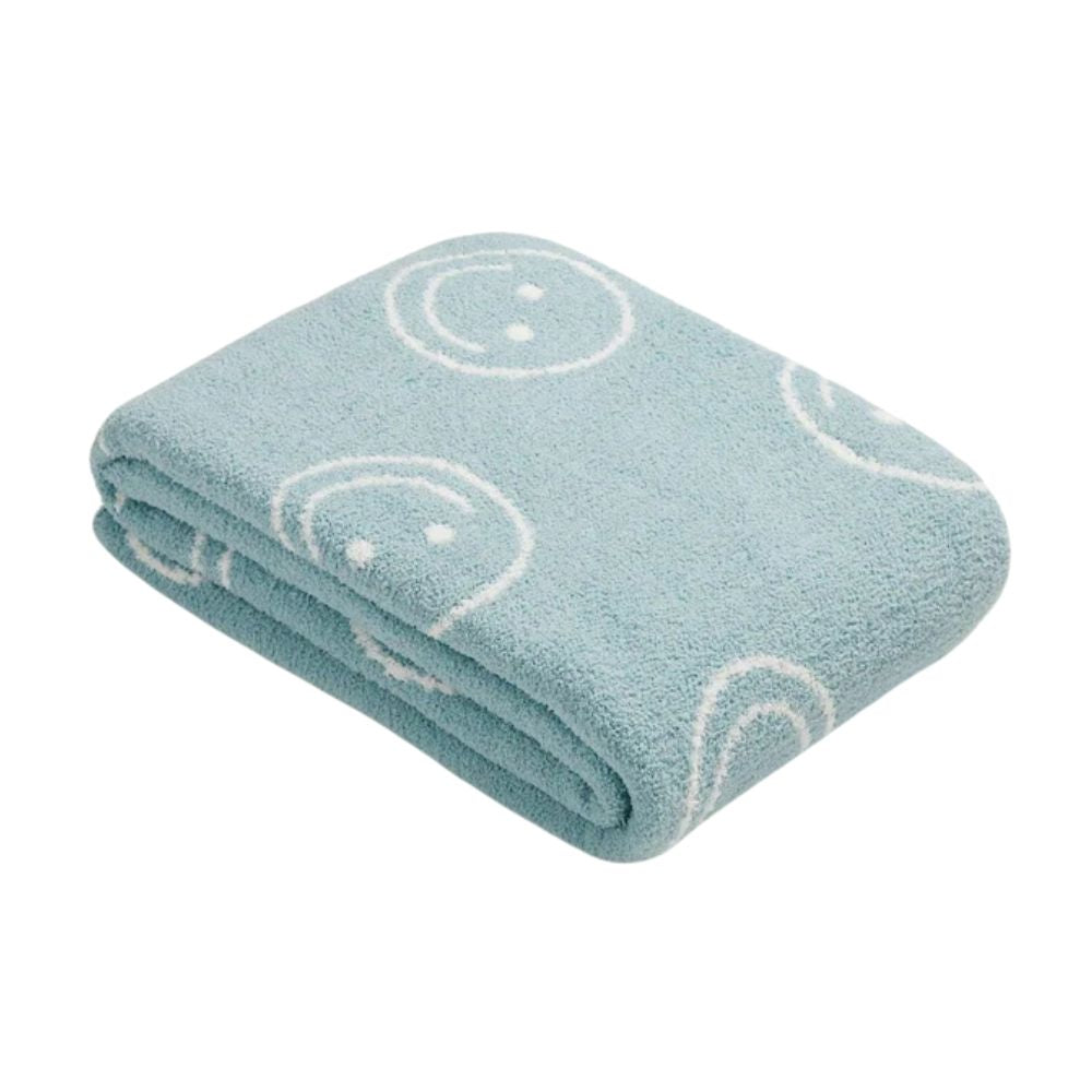 Couverture câline avec visage souriant pour plus de confort et de style 10