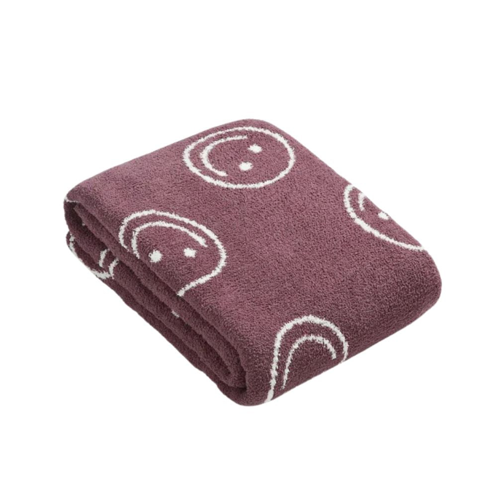 Couverture câline avec visage souriant pour plus de confort et de style 7