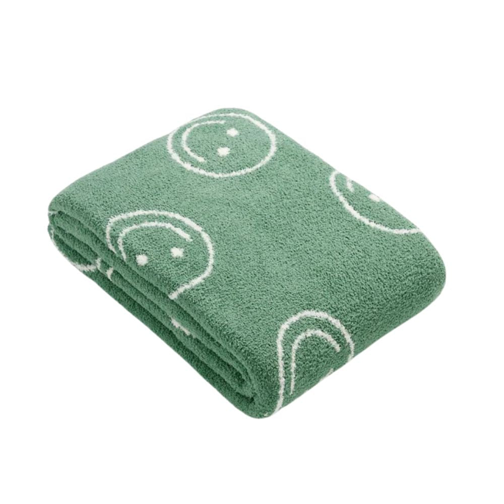 Couverture câline avec visage souriant pour plus de confort et de style 9