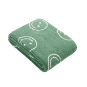 Couverture câline avec visage souriant pour plus de confort et de style 9