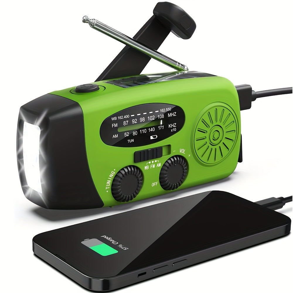 Radio d'urgence compacte avec banque de puissance de 2000mAh, solaire, manivelle à main et lampe de poche construite pour une utilisation à l'extérieur 0