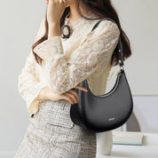 Transform your look with the chic Madison European leather shoulder bag