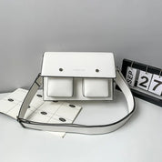 Marlee | Monikäyttöinen kompakti neliönmuotoinen olkalaukku