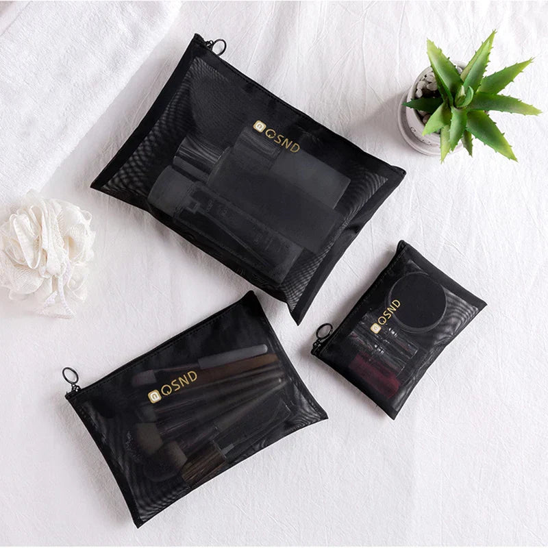 Indy | Musta verkkoinen matkameikkipussi vetoketjulla