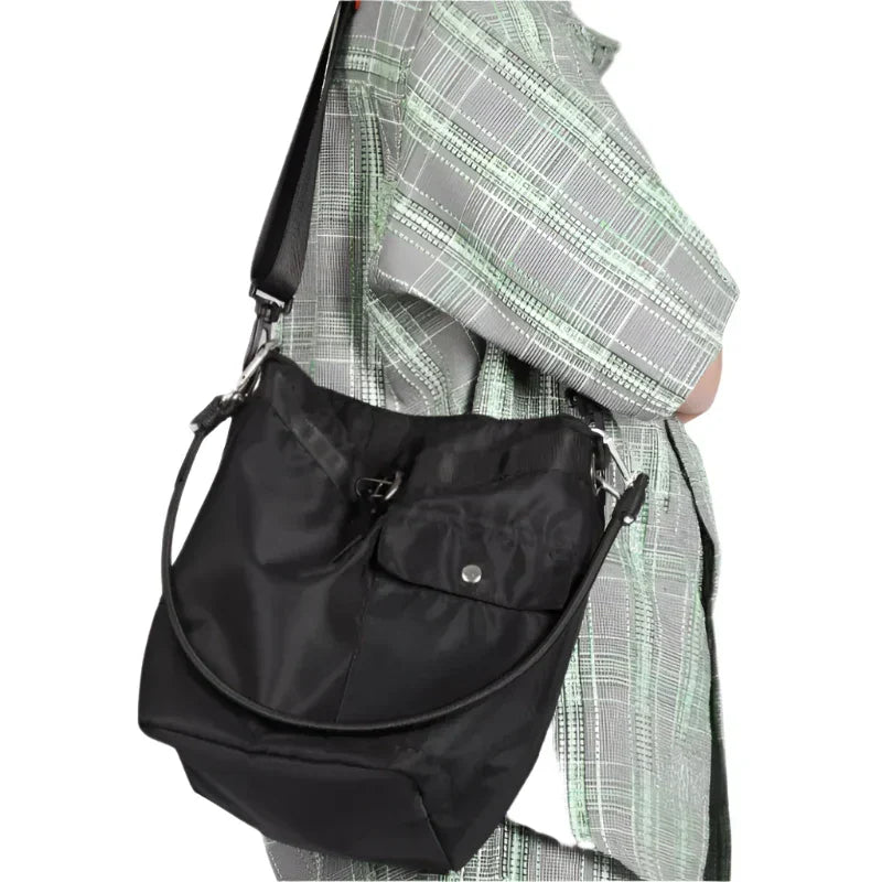 Leona | Sac bandoulière minimaliste et polyvalent adapté aux voyages