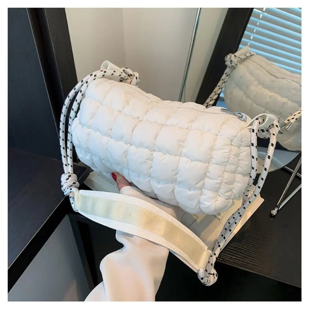 Raegan | Vesitiivis nylonista valmistettu tikattu olkalaukku matkustamiseen