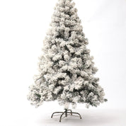 Sapin de Noël décoré de neige artificielle floquée 1