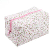 Anika | Sac de maquillage en coton matelassé à fleurs