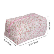 Anika | Sac de maquillage en coton matelassé à fleurs