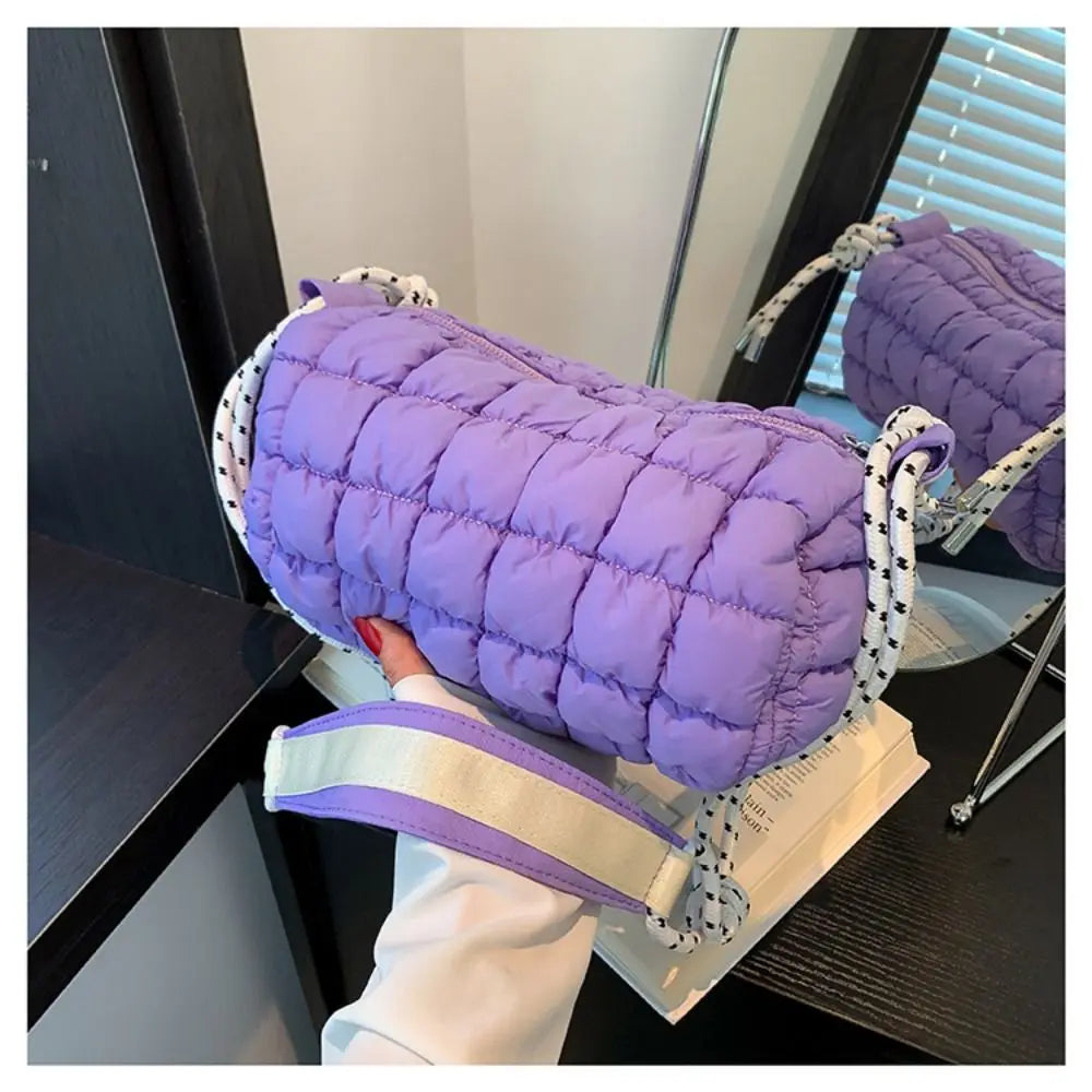 Raegan | Vesitiivis nylonista valmistettu tikattu olkalaukku matkustamiseen