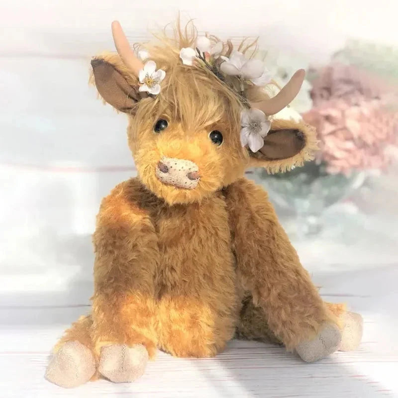 Vache des hautes terres portant des fleurs 1
