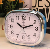 Mechanical alarm clock without ticking