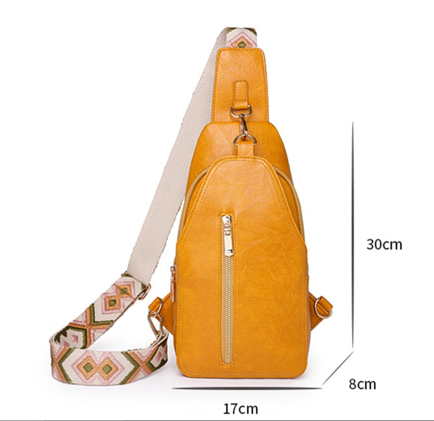 Megan | Trendikäs tikattu olkalaukku, jossa on varkaudenestotoiminto maksimaaliseen turvallisuuteen ja vaivattomaan tyyliin