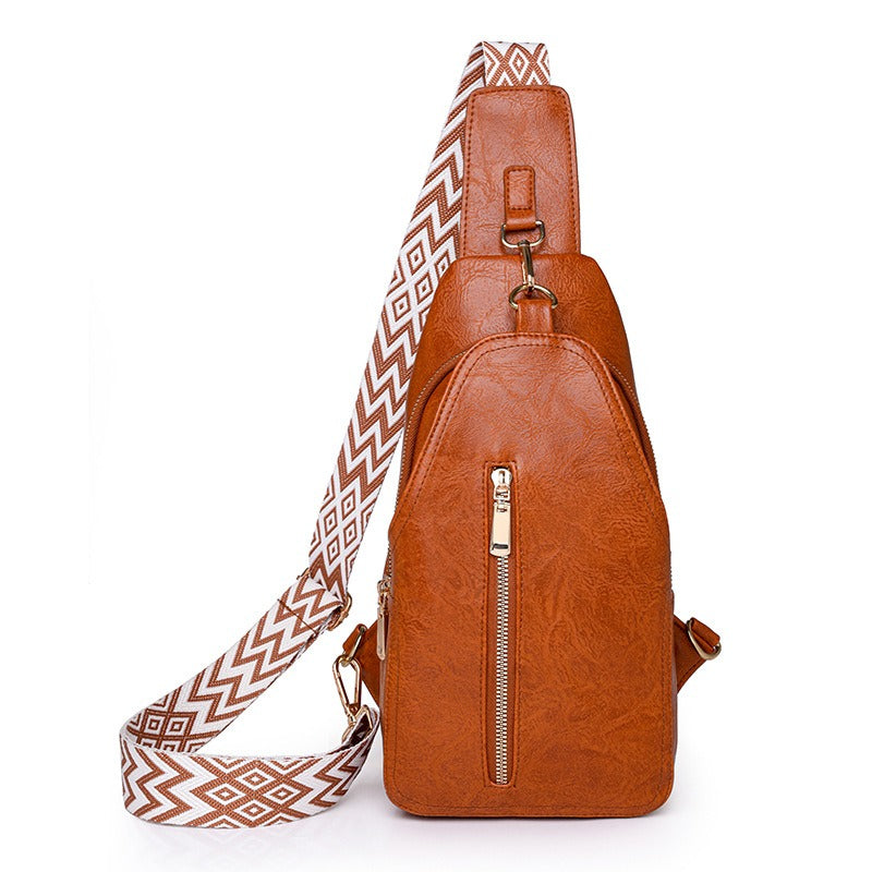 Megan | Trendikäs tikattu olkalaukku, jossa on varkaudenestotoiminto maksimaaliseen turvallisuuteen ja vaivattomaan tyyliin